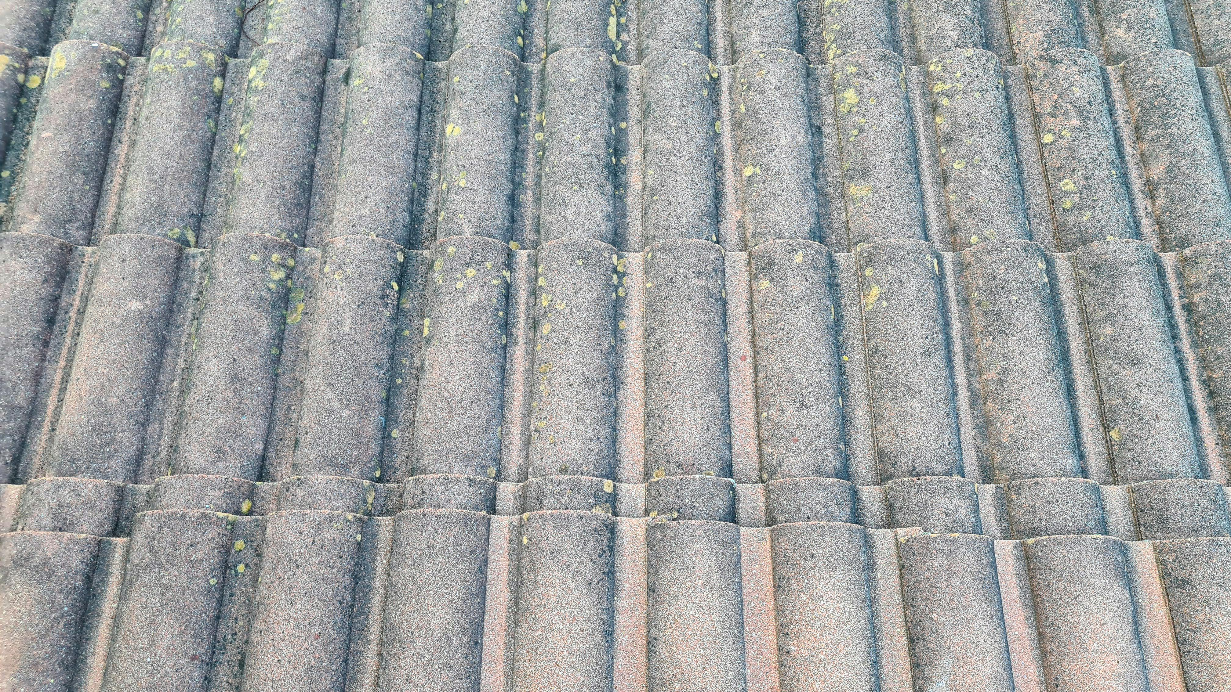 Concrete roof tiles on a residential home, combining durability with energy efficiency.